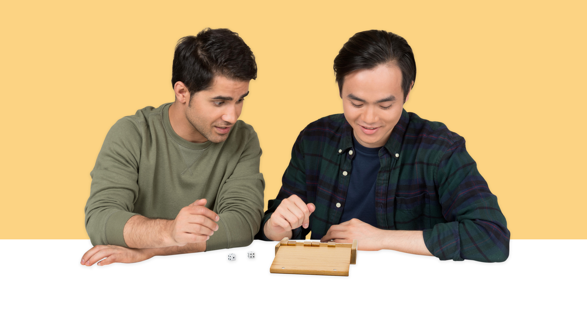 Image of one man playing an open game of Shut the Box by Velocity Promotions while another man watches him